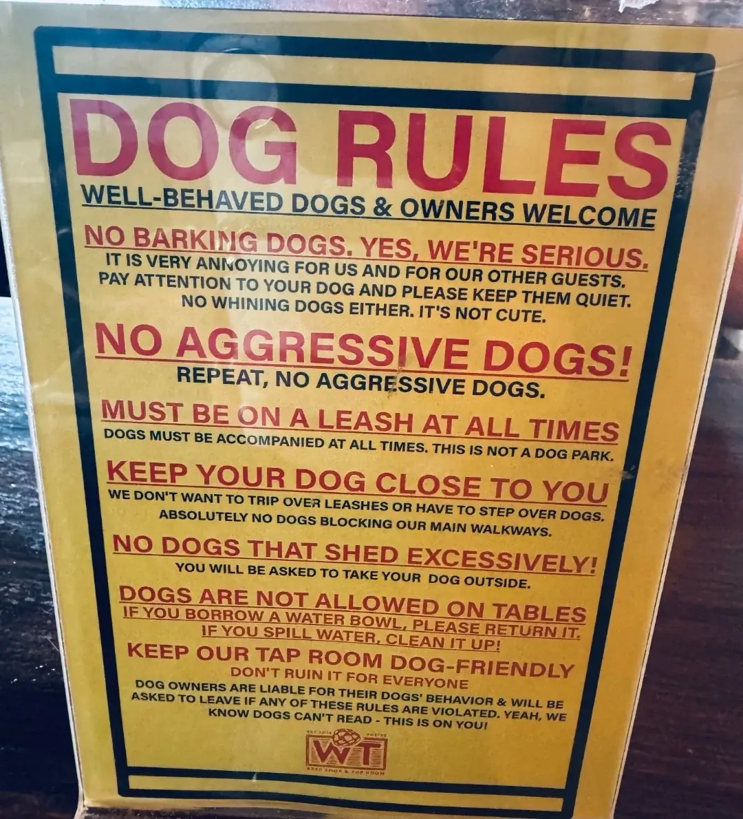 Photograph of the posted dog rules at The Wandering Tortoise